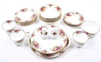 A collection of twenty eight assorted Royal Albert Country Roses pattern china.