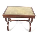 A Regency style mahogany X-frame writing table desk.