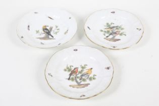 Three Meissen porcelain plates.