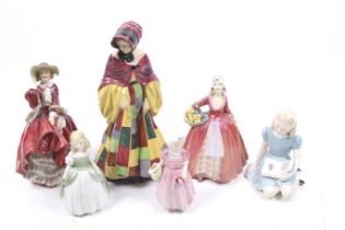 A collection of six Royal Doulton porcelain lady and girl figurines.