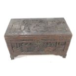 An early 20th century Chinese carved camphor wood chest.