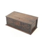 An antique oak carved box.