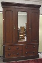A Victorian mahogany triple wardrobe.