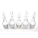 Two sets of 19th century glass decanters.