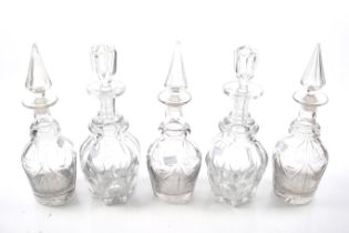 Two sets of 19th century glass decanters.