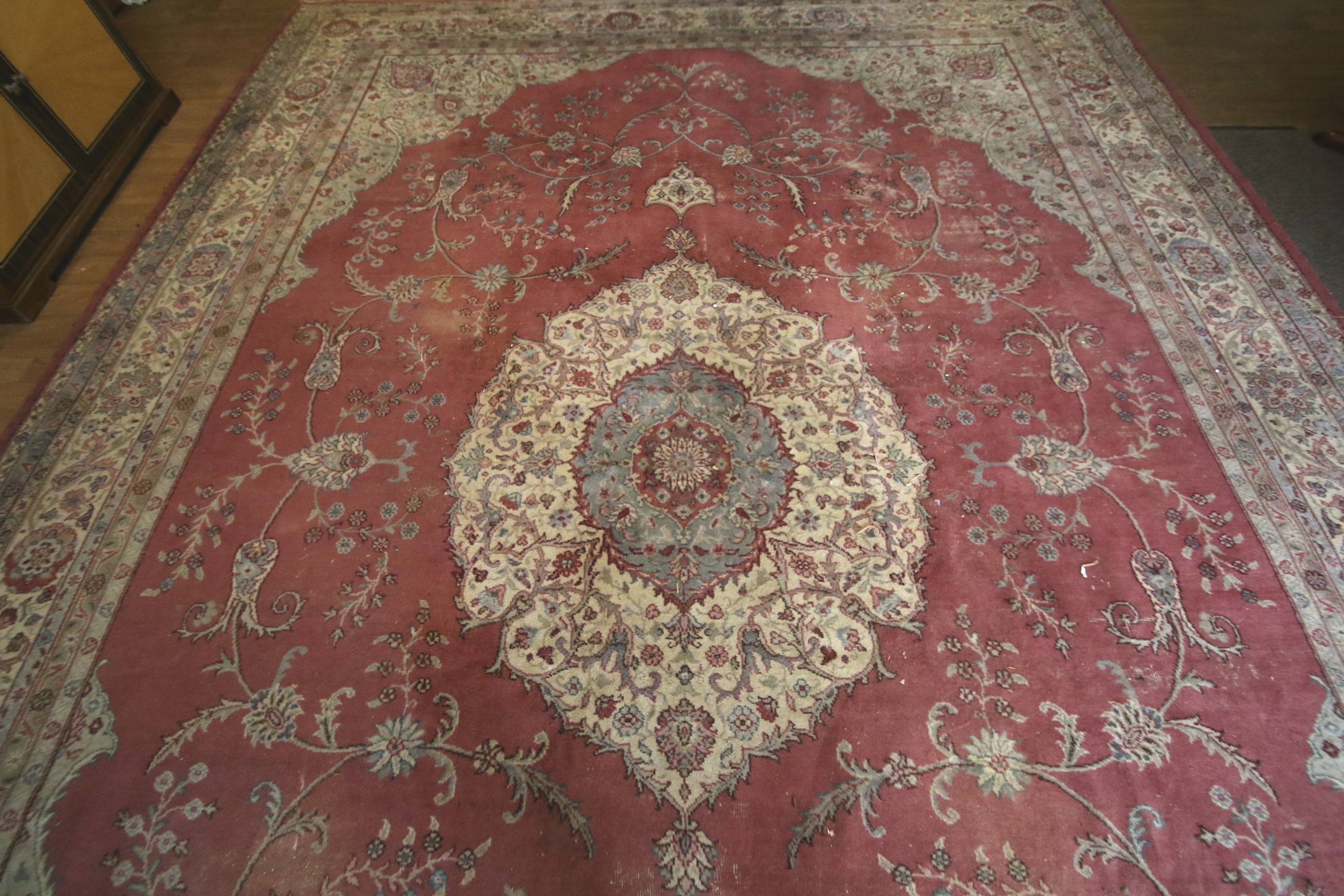 A large Persian rug. - Image 2 of 15