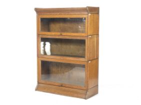 A Globe Wernicke style oak freestanding three sectional library bookcase.