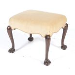 A mahogany and upholstered dressing table footstool.