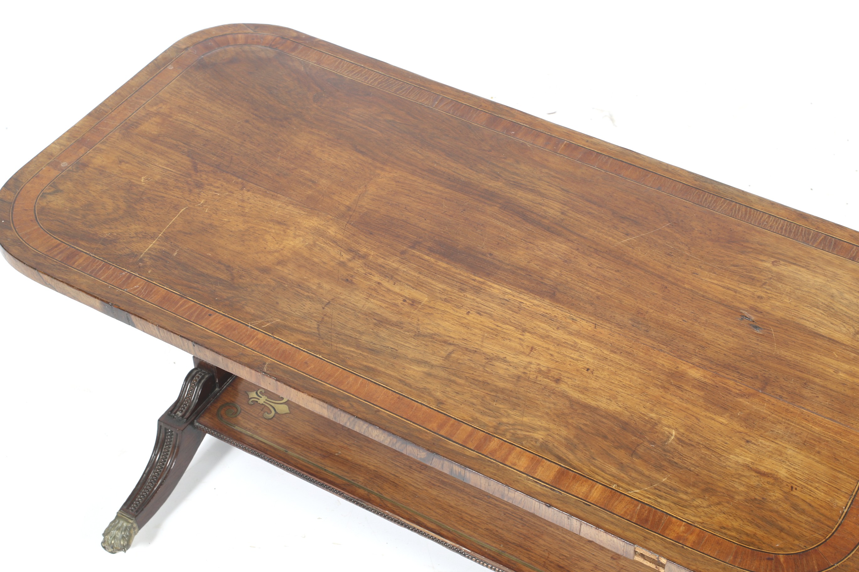 A Regency style mahogany and brass inlaid table. - Image 2 of 2