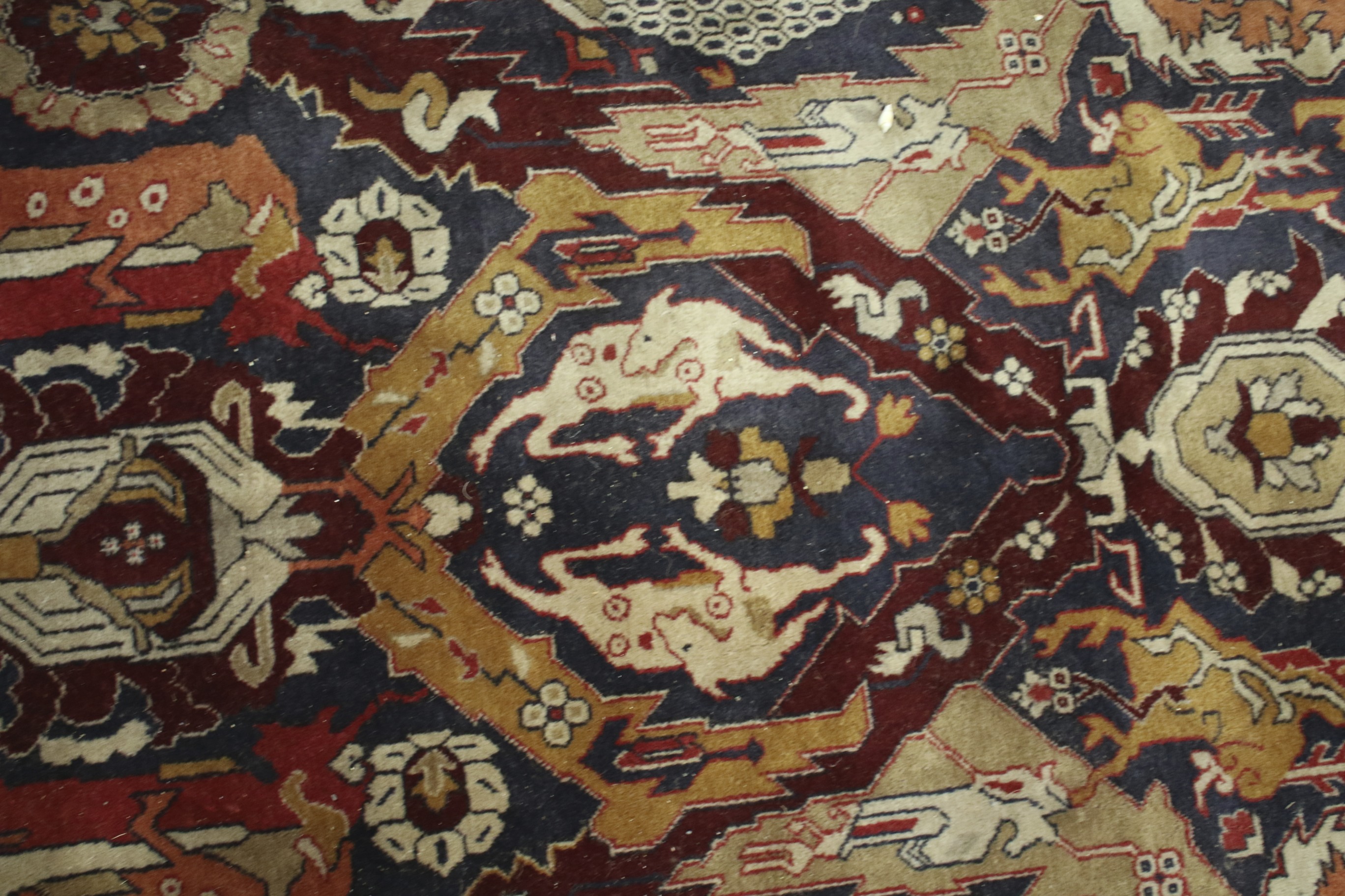 A large 20th century woollen blend rug. - Image 2 of 3