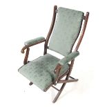 A late 19th/early 20th century mahogany folding campaign chair.