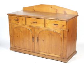 A vintage pine sideboard.