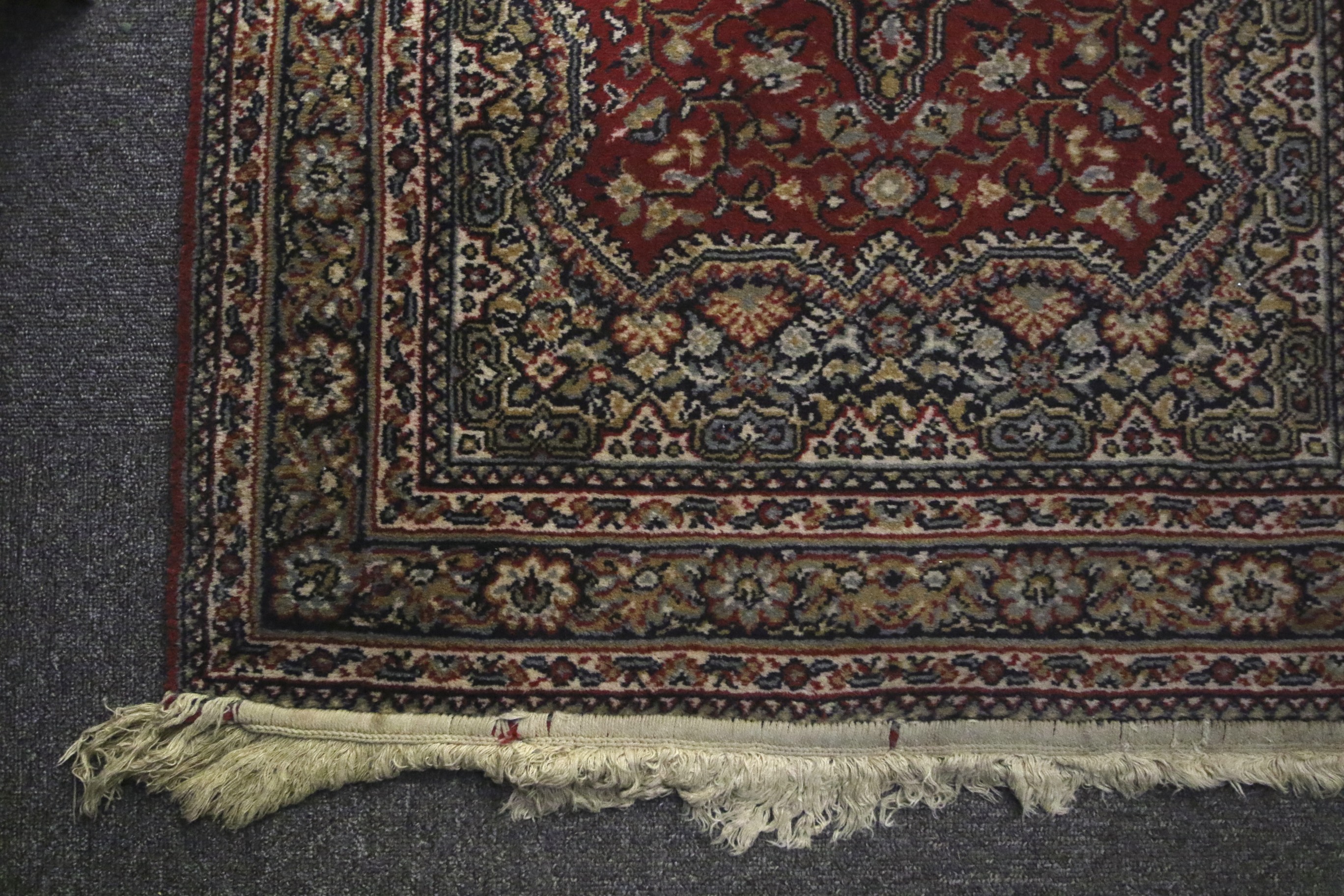 A Persian style woollen carpet runner. - Image 2 of 2