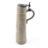 A 20th century German stein beer mug with cover.