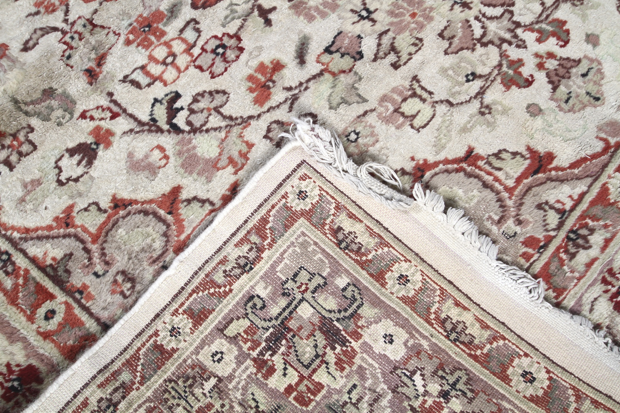 A 20th century rug. Cream ground rug with red decoration. - Image 3 of 5