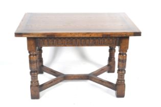 An early 20th century drawer leaf dinning table.