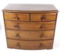 An Edwardian mahogany bow fronted chest of drawers.
