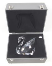 A large modern Swarovski Silver Crystal glass swan. In its original carry case. H16.