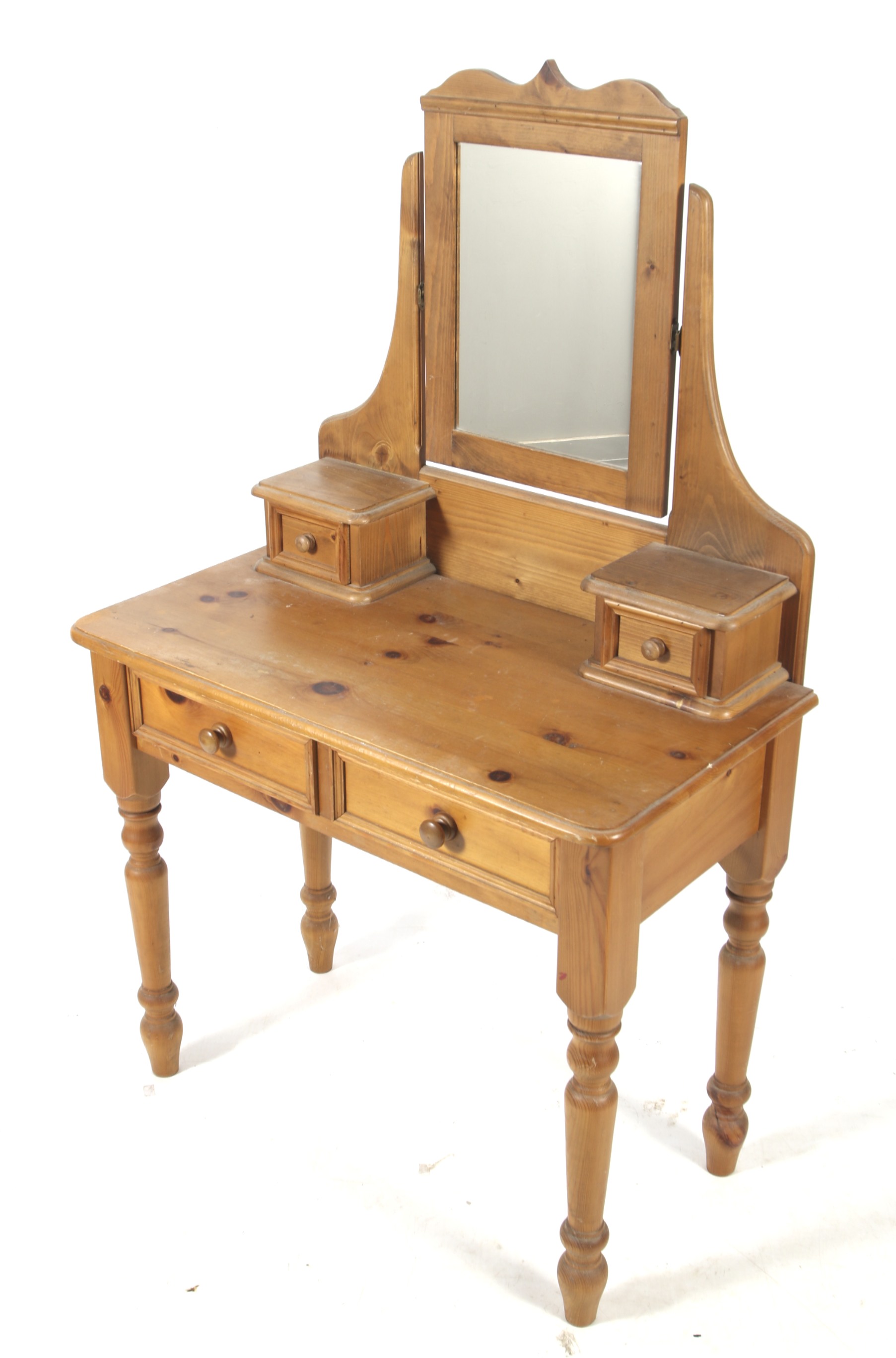 A vintage pine dressing table.