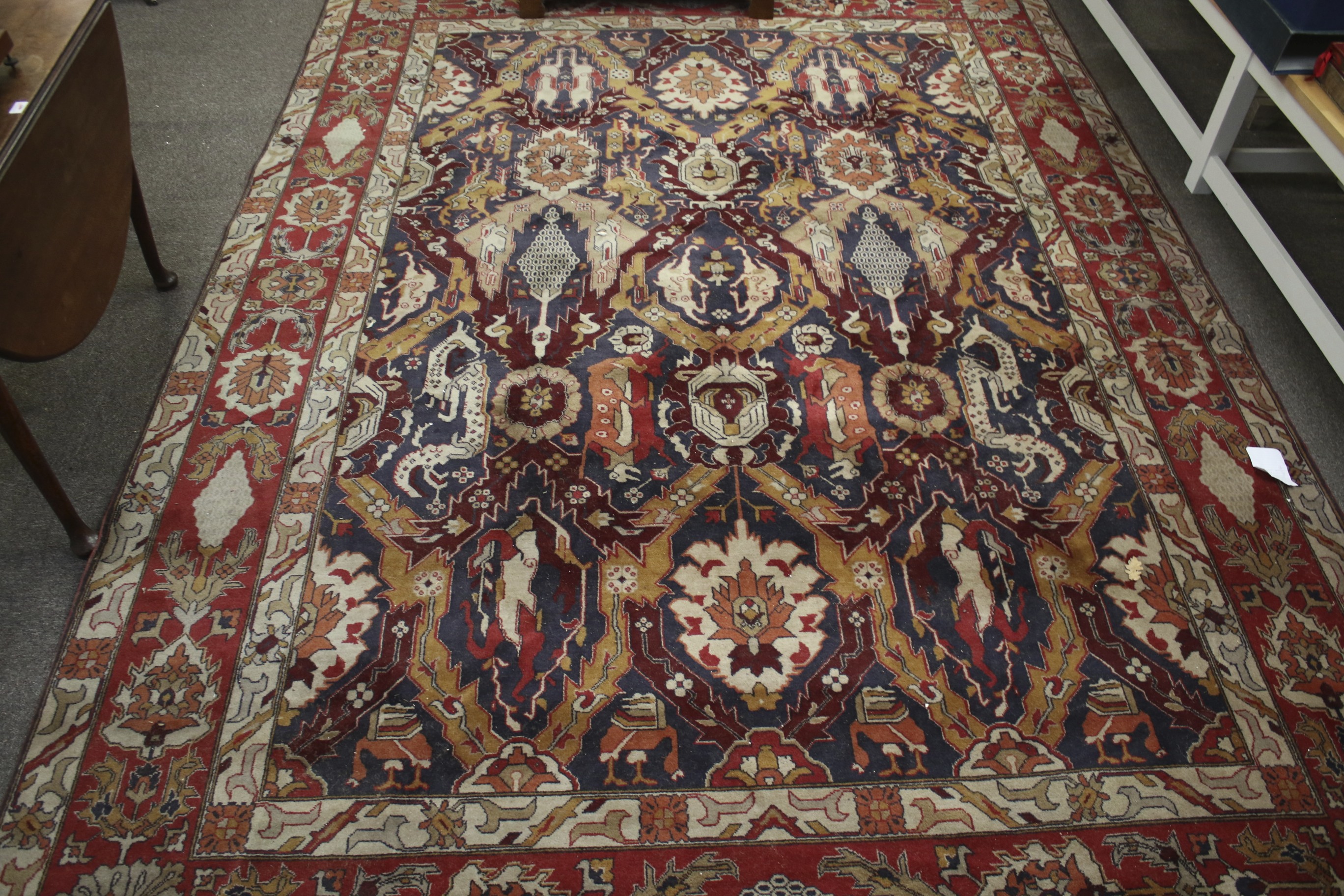 A large 20th century woollen blend rug.