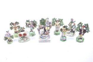A collection of nine assorted 19th century Staffordshire flatback figurines.