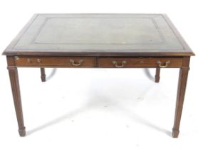A Regency style inset leather topped library table.