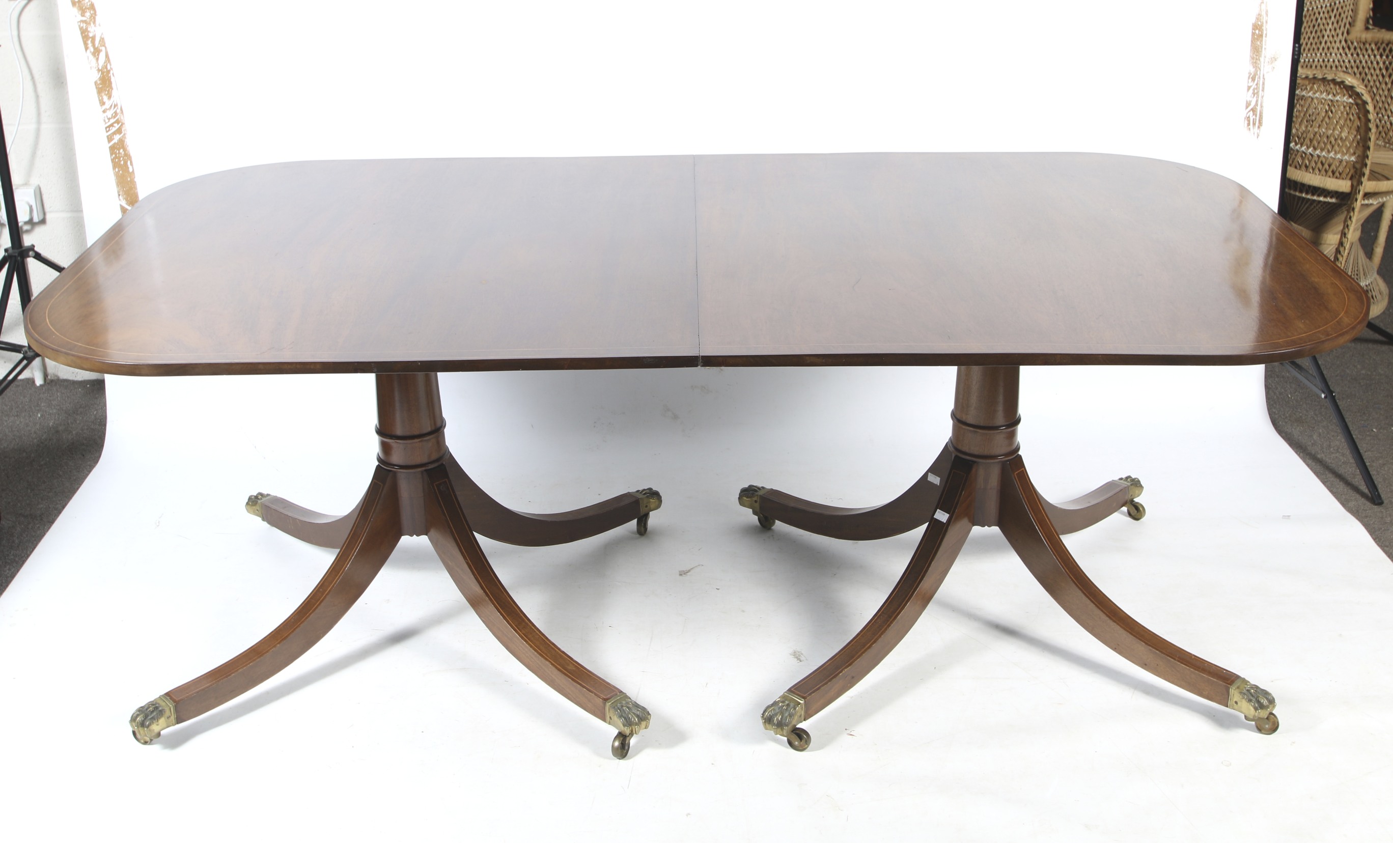 A Regency style twin pedestal dining table.