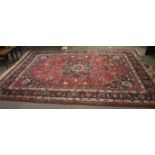 A large Persian Bakhtiari style wool carpet rug.