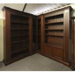 A contemporary antique style six-piece corner bookcase.