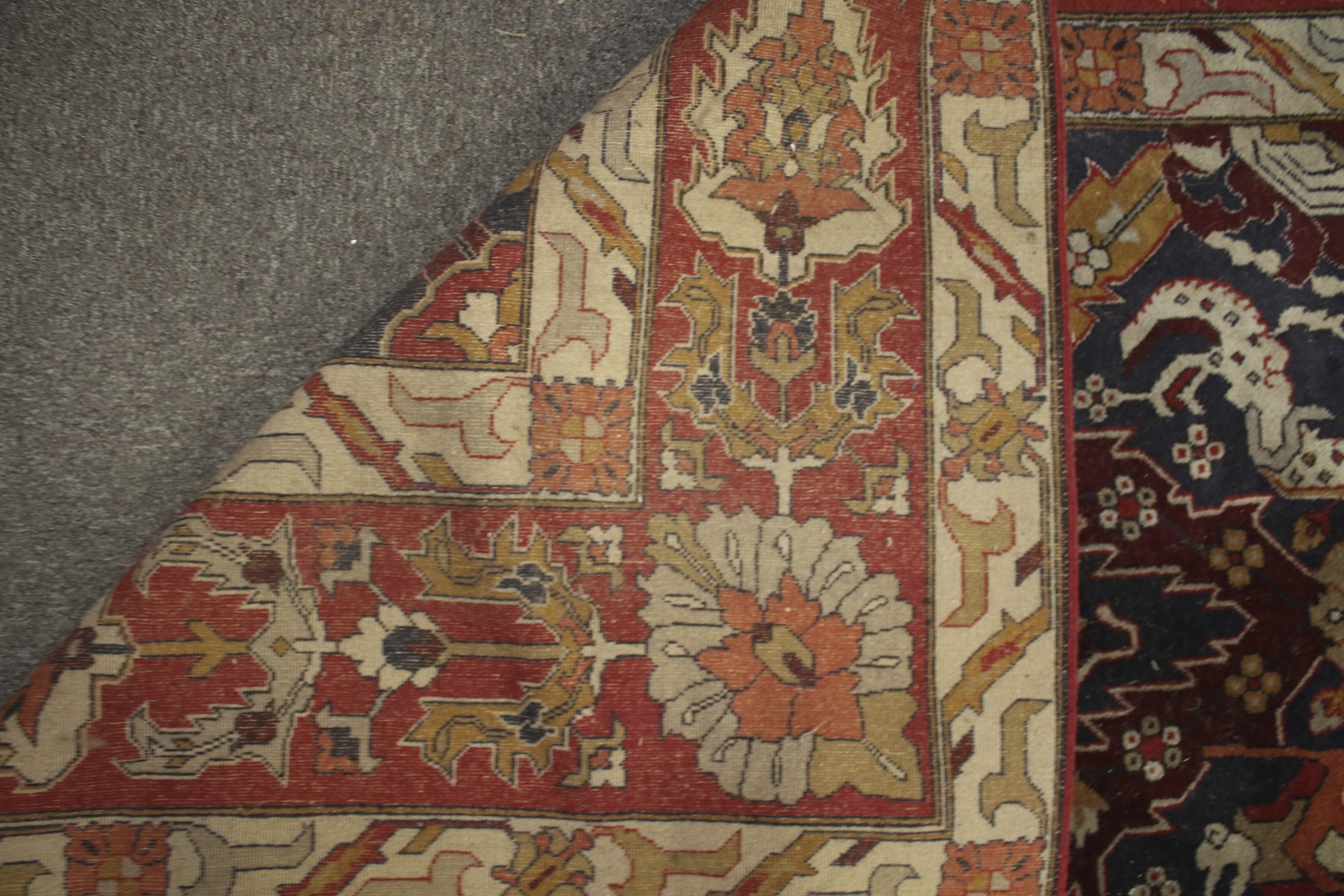 A large 20th century woollen blend rug. - Image 3 of 3