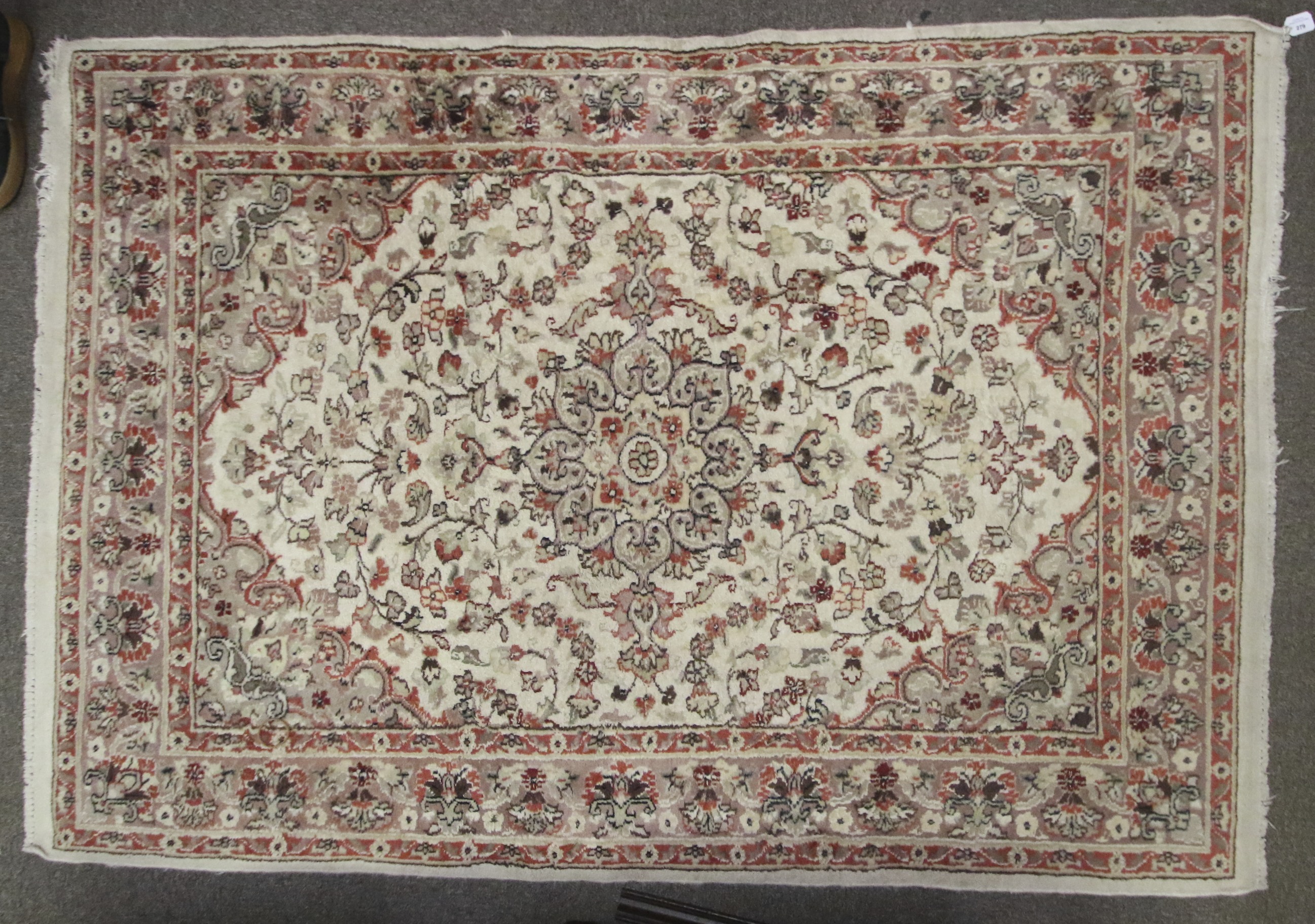 A 20th century rug. Cream ground rug with red decoration. - Image 4 of 5