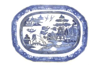 A 19th century serving platter in the Old Willow pattern.
