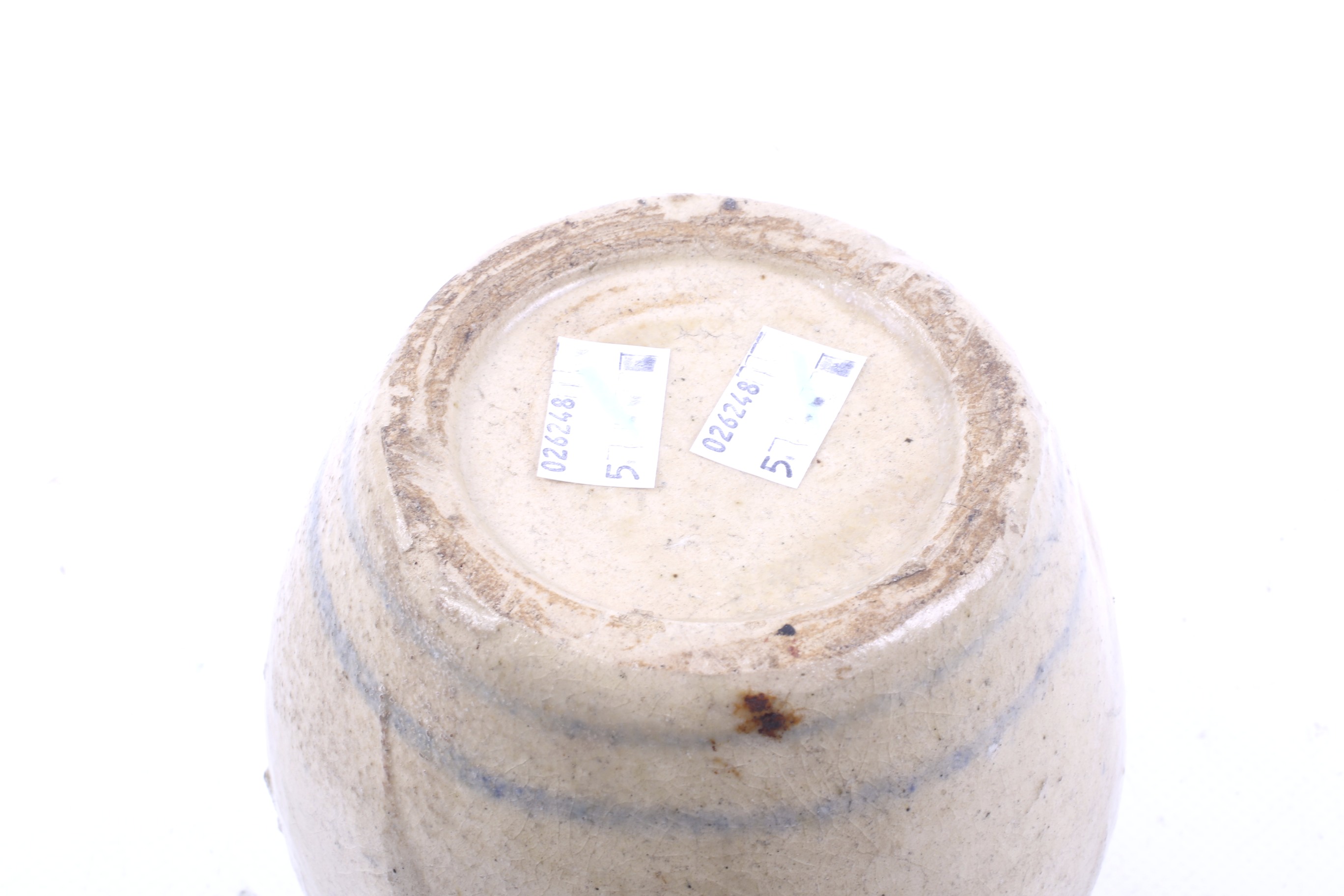 A possibly Ming dynasty beige glazed stoneware jar. - Image 3 of 3