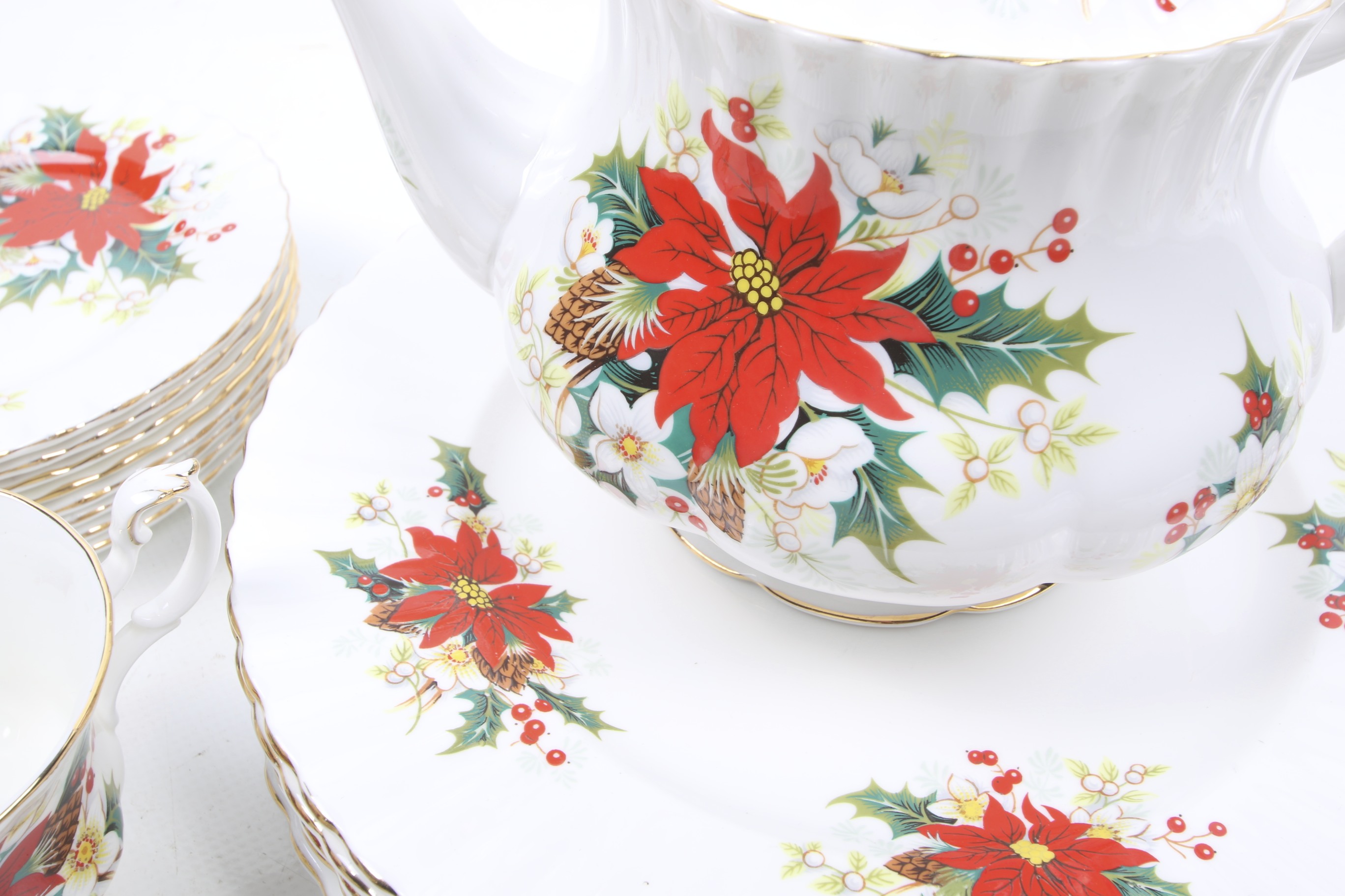 A collection of twenty piece Royal Albert Yuletide pattern tea dinner service. - Image 2 of 3