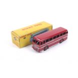 A Dinky diecast Duple Roadmaster Coach. No. 282, in red with silver trim, in original box.