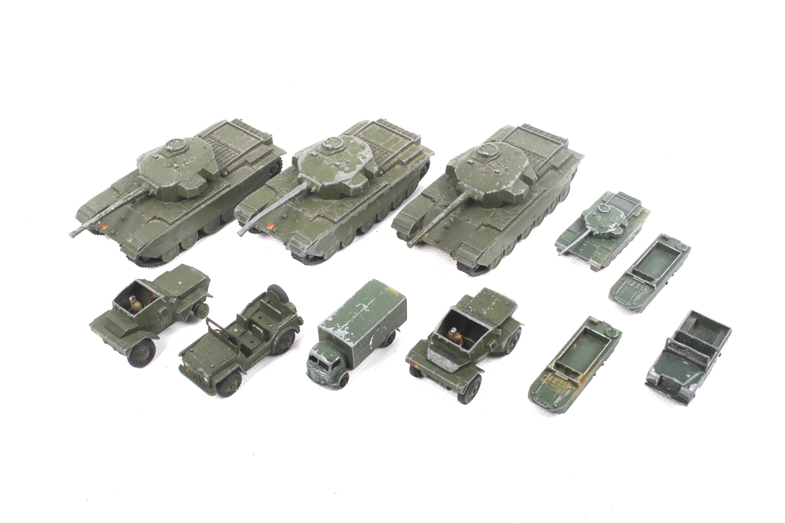Eleven diecast military vehicles. Mainly Dinky, noting tanks, cars and lorries etc, all unboxed.