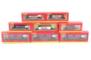 Eight Hornby OO gauge goods wagons. Featuring mainly bulkers etc, all in original boxes.
