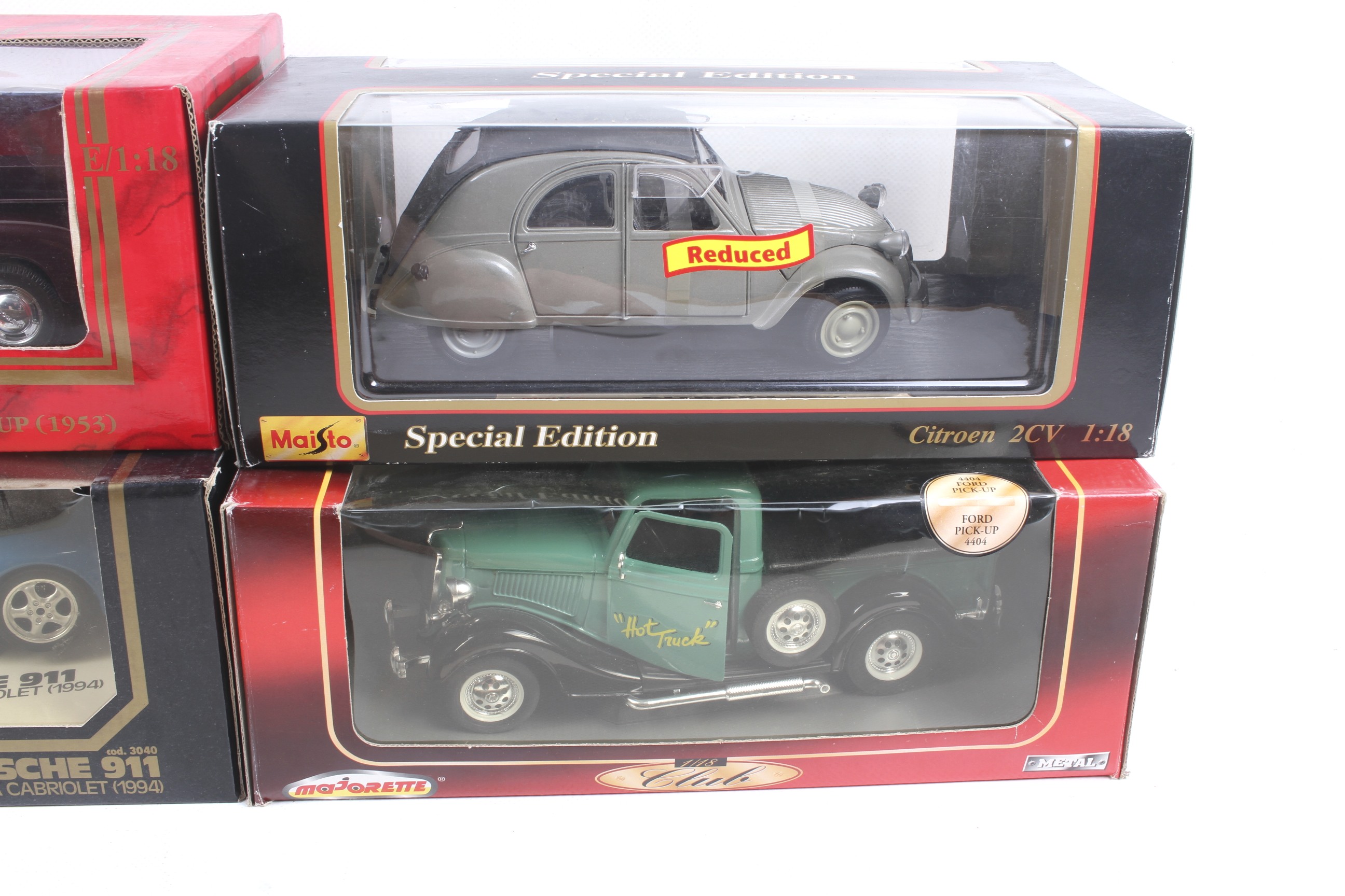 Four 1:18 scale diecast cars. - Image 3 of 3
