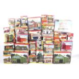 A large collection of OO gauge Hornby Skaledale buildings.