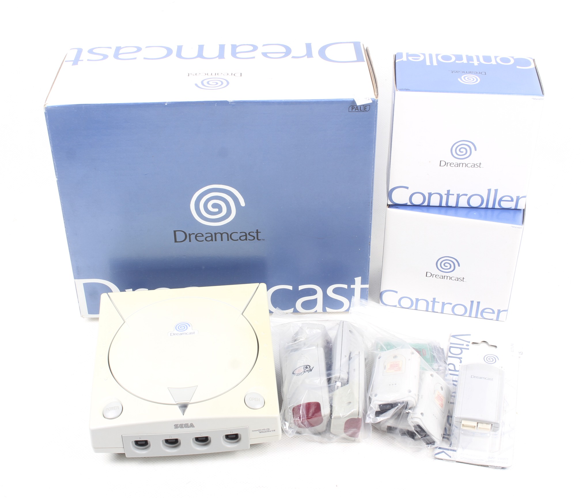 A Sega Dreamcast games console and accessories.