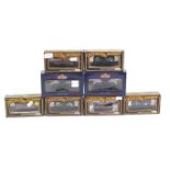 Eight OO gauge goods wagons.