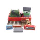 A collection of OO gauge railway accessories.