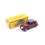 A Dinky diecast Citroen 2CV. No. 535, with red body and grey roof, in original box.