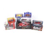 Eight boxed diecast vehicles. Comprising Burago Ferrari 250 GTO no. 3011, Corgi Porsche 956 no.