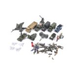 A collection of diecast metal military vehicles and model soldiers.