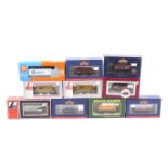 Ten OO gauge goods wagons.