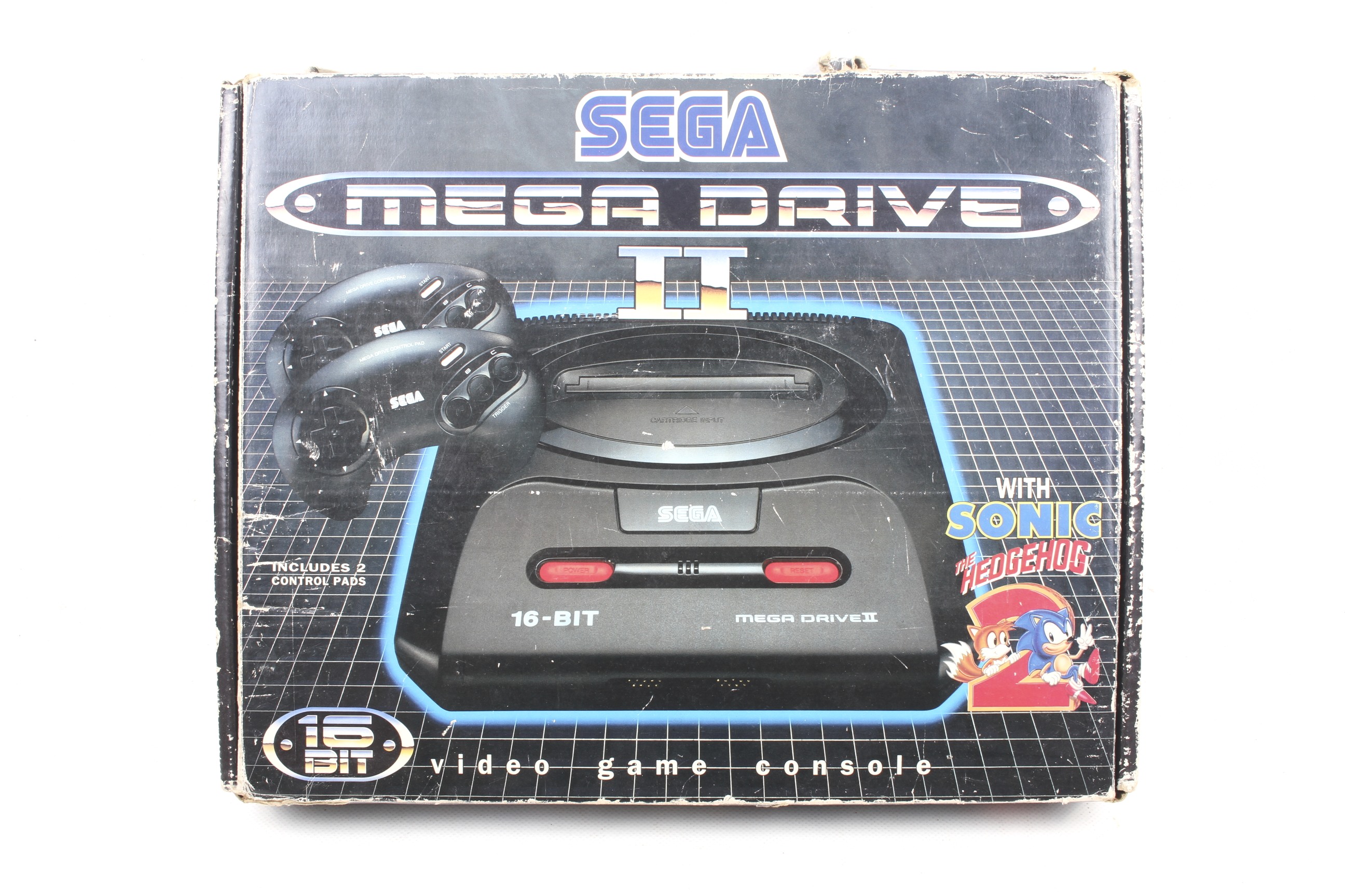 A Sega Mega Drive 2 video game console plus games.