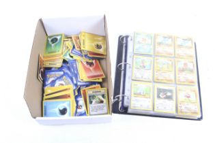 A collection of 1990s Pokemon cards in an album plus loose.