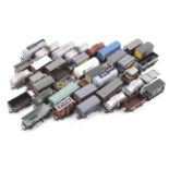 A collection of OO gauge goods wagons. Including bulkers and container cars etc, all unboxed.