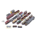 A OO gauge diesel locomotive and goods wagons.